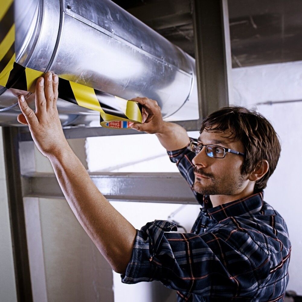 Markeerimisteip tesa® Professional 33 m x 50 mm kollane/must